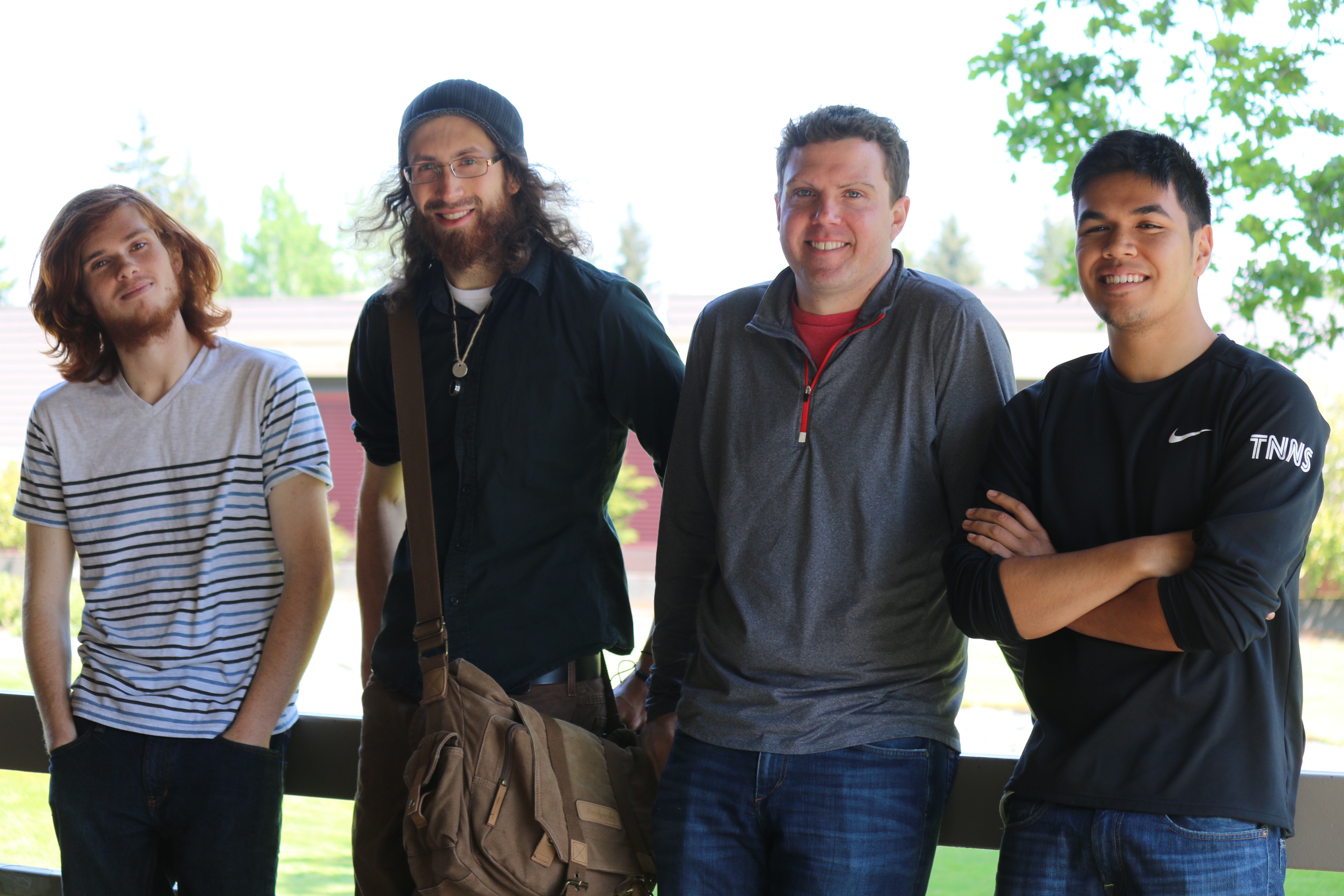 The "REFRACTION" film crew from left to right: Kuper Sletcha (producer), Chris Cook (writer), Bruce Stead (director and editor), and Jordan Tran (cinematographer). 